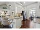 Spacious kitchen island with granite countertops and breakfast bar at 3167 Bellingham Way, Lithia Springs, GA 30122