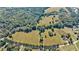 Large lot with open fields and surrounding woodlands at 1490 Lee Peters Rd, Loganville, GA 30052