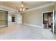 Spacious bedroom with mirrored closet doors and ceiling fan at 1490 Lee Peters Rd, Loganville, GA 30052