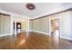 Formal dining room with hardwood floors and views to kitchen at 1490 Lee Peters Rd, Loganville, GA 30052