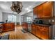 Open kitchen with granite countertops and hardwood floors at 1337 Benteen Park Se Dr, Atlanta, GA 30315