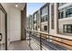 Private balcony with modern metal railing overlooking the community at 1099 North Ne Ave # 13, Atlanta, GA 30307