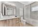 Clean bathroom with a shower/tub combo and wood vanity at 1099 North Ne Ave # 13, Atlanta, GA 30307