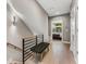 Light-filled hallway with bench and stairs to upper level at 1099 North Ne Ave # 13, Atlanta, GA 30307