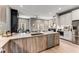 Modern kitchen with island, stainless steel appliances, and light wood cabinets at 1099 North Ne Ave # 13, Atlanta, GA 30307
