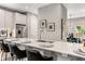 Modern kitchen with a large island, quartz countertops and breakfast bar at 1099 North Ne Ave # 13, Atlanta, GA 30307