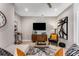 Living room with large TV, comfortable seating, and stylish decor at 1099 North Ne Ave # 13, Atlanta, GA 30307