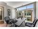 Home office with large window and two black chairs at 1099 North Ne Ave # 13, Atlanta, GA 30307