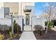 Front entry of home with gate and modern design at 6750 Avis Walk, Alpharetta, GA 30005