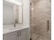 Modern bathroom with quartz vanity and walk-in shower at 1237 Memorial Se Dr # 101, Atlanta, GA 30316