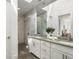 Elegant bathroom with double vanity, marble shower, and modern fixtures at 241 Maynard Se Ter # 14, Atlanta, GA 30316