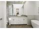 Elegant bathroom with double vanity and free-standing tub at 241 Maynard Se Ter # 14, Atlanta, GA 30316