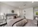 Spacious bedroom with plush carpet and en-suite bathroom at 241 Maynard Se Ter # 14, Atlanta, GA 30316