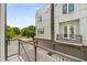 Exterior view of modern townhome with balcony and city views at 241 Maynard Se Ter # 14, Atlanta, GA 30316