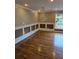 Bright dining room with hardwood floors, wainscoting, and chandelier at 2924 Collier Nw Dr, Atlanta, GA 30318