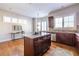 Island kitchen with granite countertops and hardwood floors at 5877 Riverstone Cir # 17, Atlanta, GA 30339