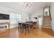 Open concept dining area with cork flooring at 403 Breanna Ct, Auburn, GA 30011