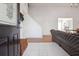 Bright entryway with tile flooring, coat rack, and view into the living room at 403 Breanna Ct, Auburn, GA 30011