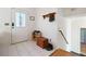 Bright entryway with tile floors and storage bench at 403 Breanna Ct, Auburn, GA 30011