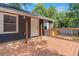 Back deck with wooden railings, offering a relaxing outdoor space at 4623 Lawrenceville Hwy, Tucker, GA 30084