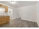 Bright dining area with wood-look floors and access to the kitchen at 4623 Lawrenceville Hwy, Tucker, GA 30084