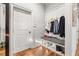 Entryway with built-in bench, cubbies, and coat hooks at 5665 Bridleton Xing, Suwanee, GA 30024