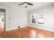 Bright bedroom with hardwood floors and ceiling fan at 1015 Deckner Sw Ave, Atlanta, GA 30310