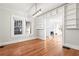 Bright dining room with hardwood floors and fireplace view at 1015 Deckner Sw Ave, Atlanta, GA 30310