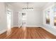 Spacious dining room with hardwood floors and access to kitchen at 1015 Deckner Sw Ave, Atlanta, GA 30310