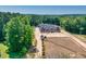 Luxury home and equestrian facilities nestled in a wooded area at 1730 Etchison Spur, Loganville, GA 30052