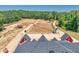 Aerial view of property showcasing expansive land and equestrian facilities at 1730 Etchison Spur, Loganville, GA 30052