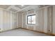 Unfinished basement room with window and drywall at 1730 Etchison Spur, Loganville, GA 30052