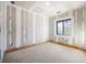 Unfinished basement room with window and drywall at 1730 Etchison Spur, Loganville, GA 30052