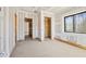 Unfinished basement room with closet and window at 1730 Etchison Spur, Loganville, GA 30052