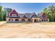 Brick house under construction, showcasing a red and white exterior at 1730 Etchison Spur, Loganville, GA 30052