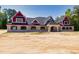 Brick house under construction, showcasing a red and white exterior at 1730 Etchison Spur, Loganville, GA 30052
