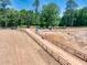 Aerial view of the property's perimeter fence and surrounding landscape at 1730 Etchison Spur, Loganville, GA 30052