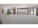 Unfinished three-car garage with high ceilings and ample space at 1730 Etchison Spur, Loganville, GA 30052