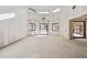 Spacious great room with large windows and high ceilings at 1730 Etchison Spur, Loganville, GA 30052