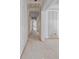 Long hallway leading to bedrooms and other rooms at 1730 Etchison Spur, Loganville, GA 30052