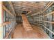 Image shows the interior framing of a staircase under construction at 1730 Etchison Spur, Loganville, GA 30052