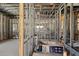 Interior framing of a new home, showing plumbing and electrical preparation at 1730 Etchison Spur, Loganville, GA 30052