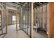 Interior framing of new construction home showing framing for multiple rooms and a bathroom at 1730 Etchison Spur, Loganville, GA 30052