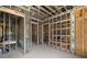 Interior framing of a new construction home showing the structure of multiple rooms at 1730 Etchison Spur, Loganville, GA 30052