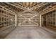 Interior under construction, showcasing metal framing and wooden supports at 1730 Etchison Spur, Loganville, GA 30052