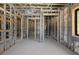 Interior framing of a new home with multiple rooms at 1730 Etchison Spur, Loganville, GA 30052