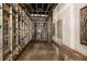 Interior framing of a hallway under construction, showing the metal studs and electrical conduits at 1730 Etchison Spur, Loganville, GA 30052