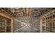 Interior framing of a house under construction, showing the structure at 1730 Etchison Spur, Loganville, GA 30052