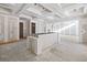 Island kitchen with high ceilings and lots of light at 1730 Etchison Spur, Loganville, GA 30052