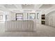 Open concept kitchen with large island and windows at 1730 Etchison Spur, Loganville, GA 30052